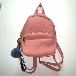 Small pink backpack